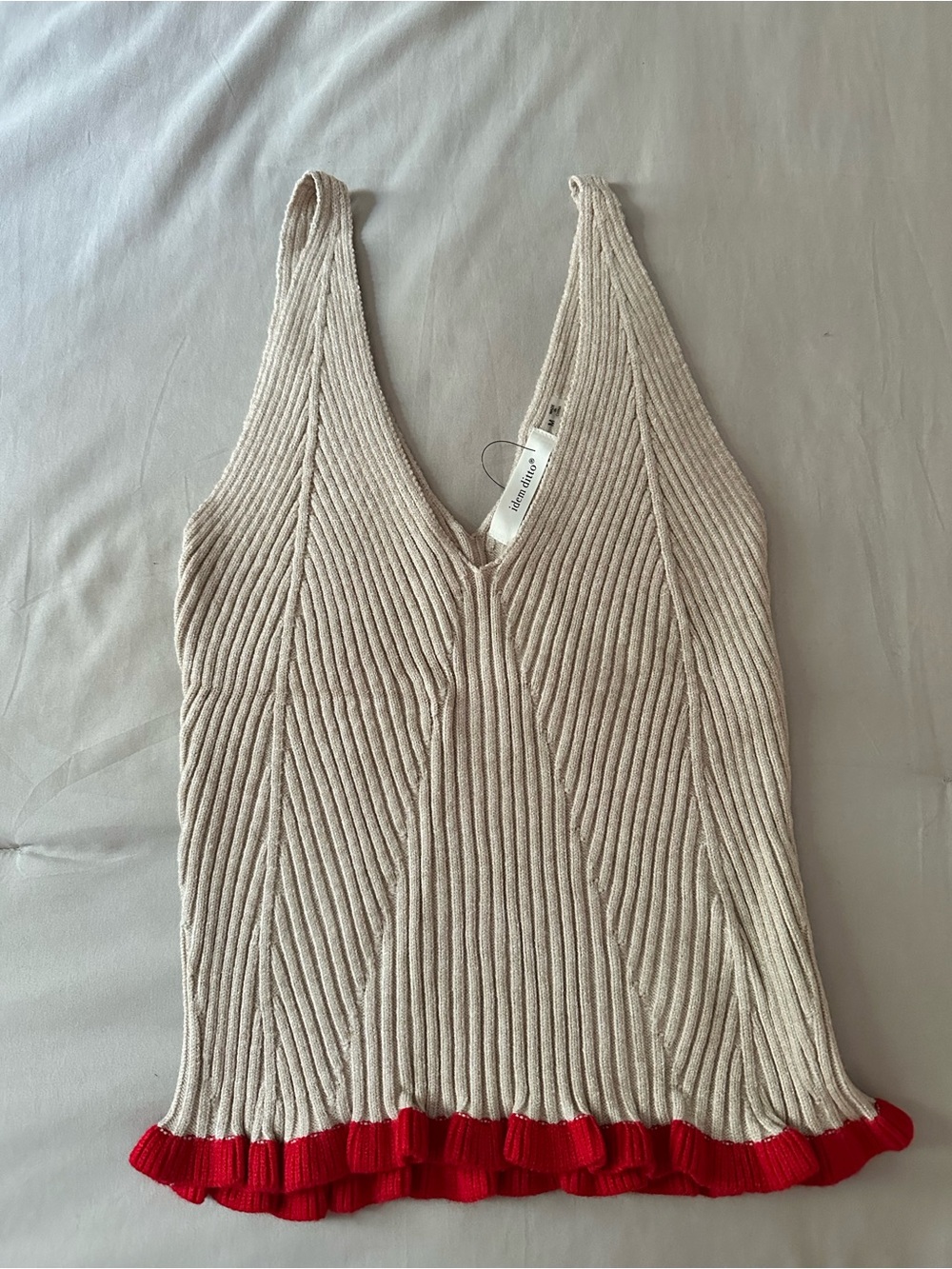 Cream Ribbed V-Neck Tank with Red Ruffle Hem